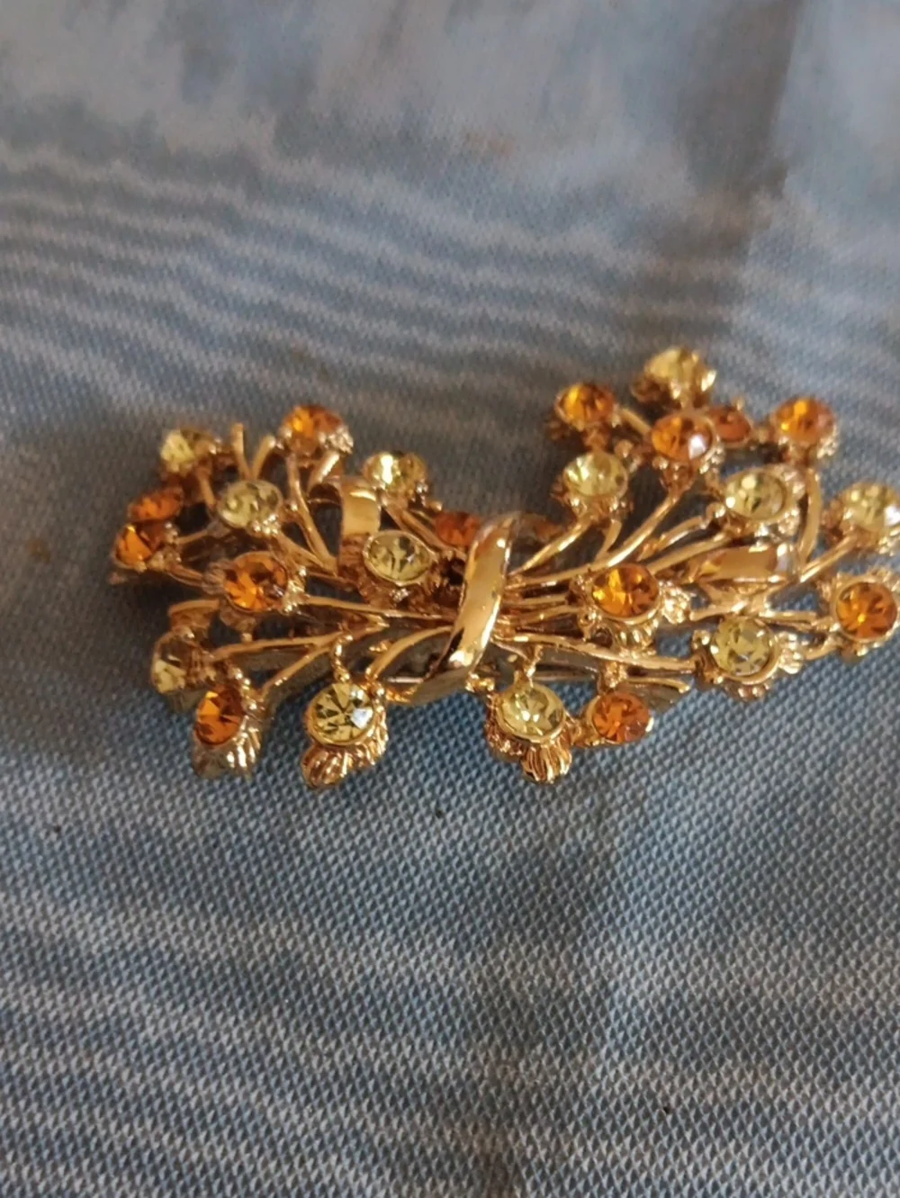 Gold-Tone Floral Crystal Brooch with Amber and Champagne Stones